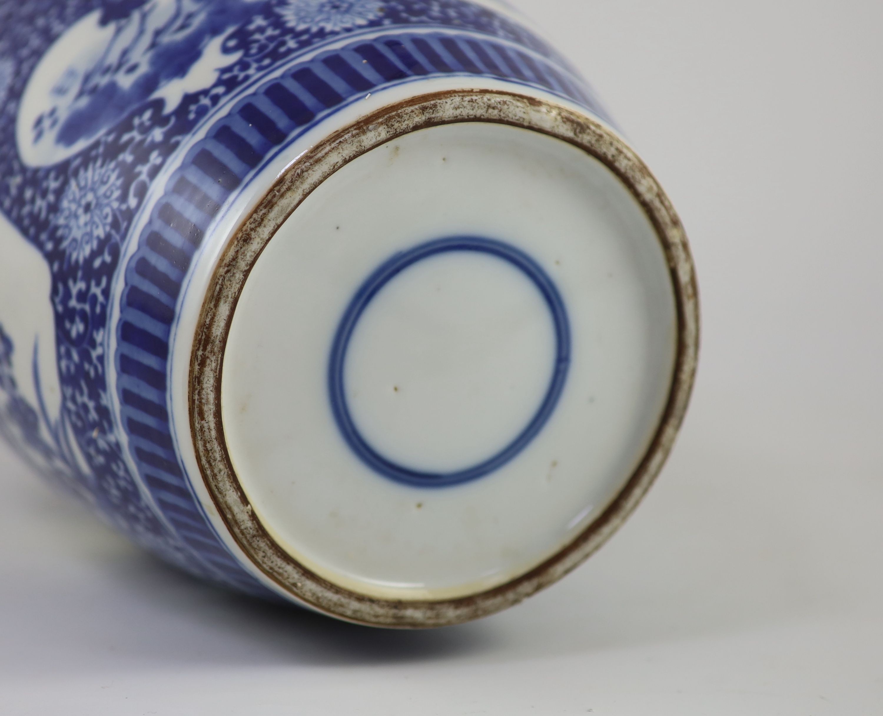 A large Chinese blue and white ovoid jar, 19th century, 35cm high, wood cover